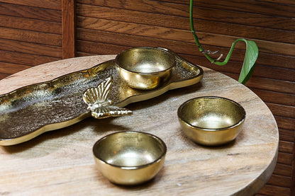 Gold tray with serving bowls