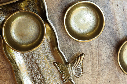 Gold tray with serving bowls