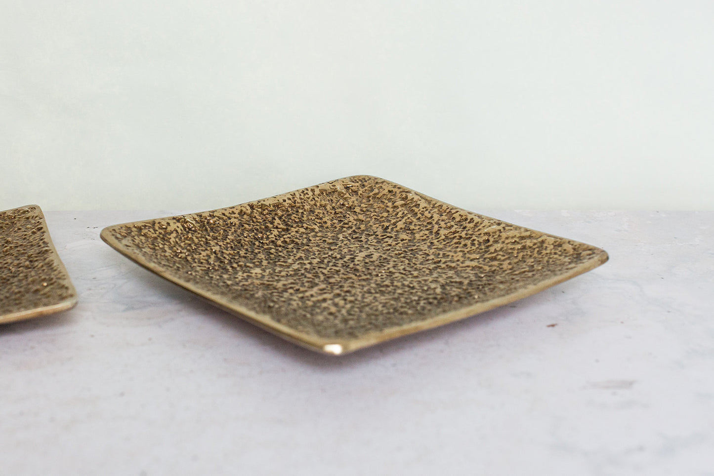 Decorative plate with antique gold finish