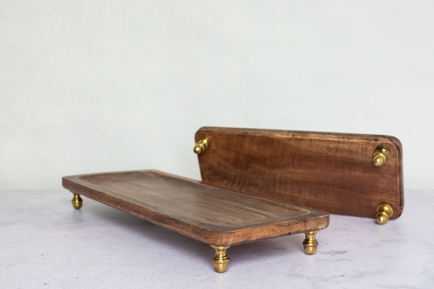 Wood serving trays with gold feet (set of 2)